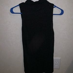 Sheer, sleeveless turtleneck